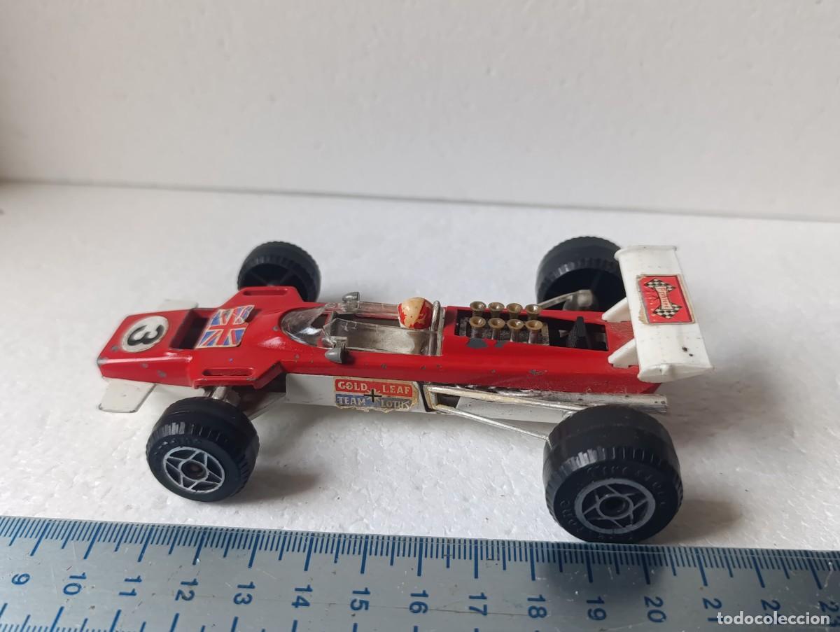 Coches a escala: FIGURA DE PVC - LOTUS 63 F1 - ESC. 1/32 - ITALIA - POLITOYS - ( CUPULA ROTA )