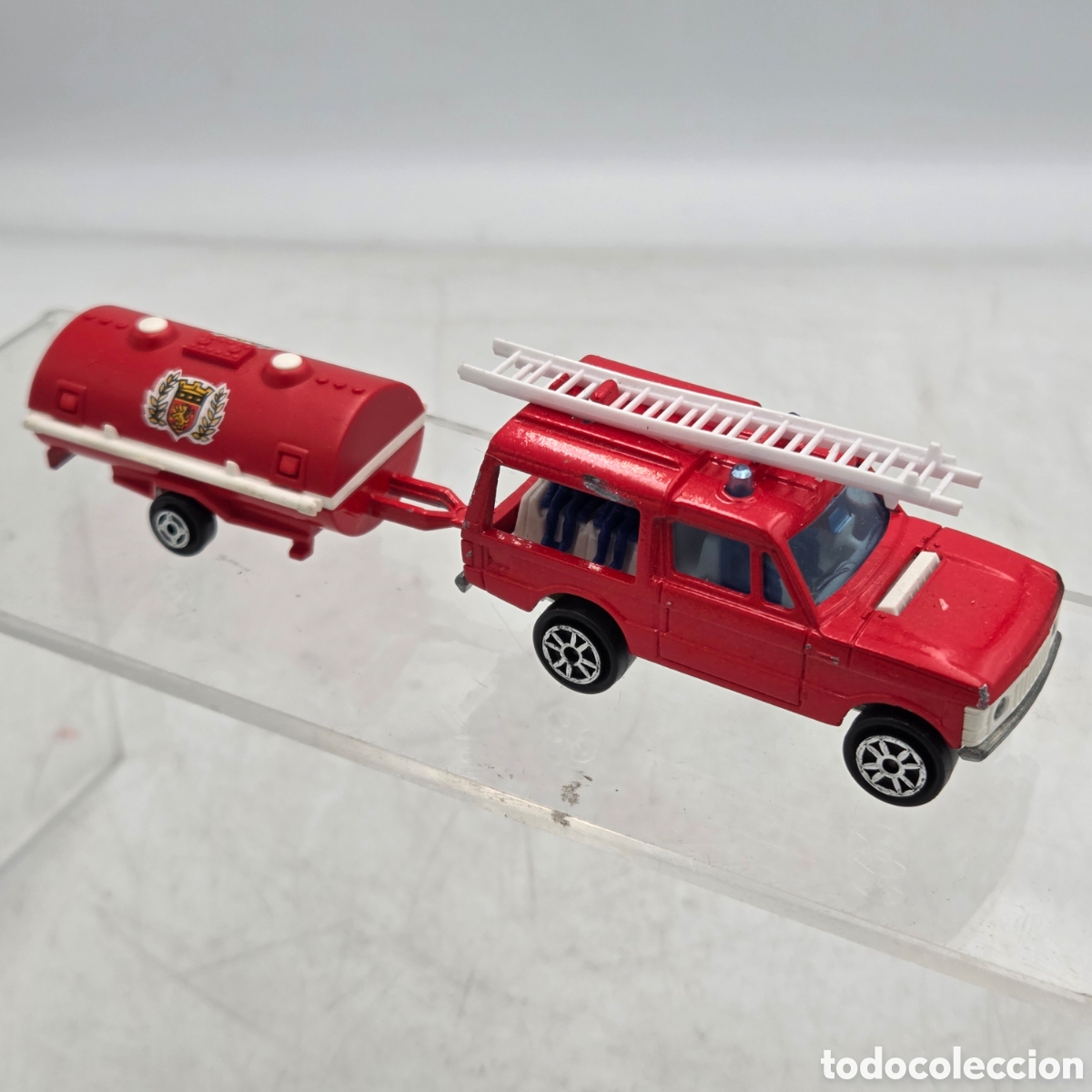 Auto in scala: RANGE ROVER BOMBEROS CON CISTERNA MAJORETTE 1:60