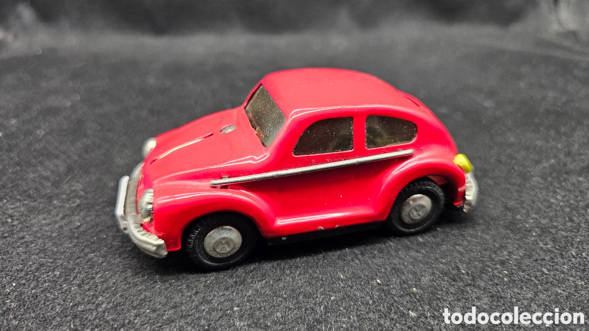 Coches a escala: Coche vintage de hojalata de fricci&oacute;n