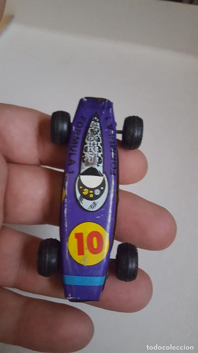 Coches a escala: Peque&ntilde;o coche de hojalata, antiguo Formula 1/F1