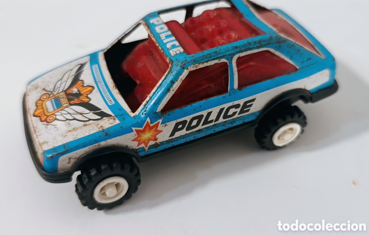 Coches a escala: Coche de polic&iacute;a de chispas de mechero