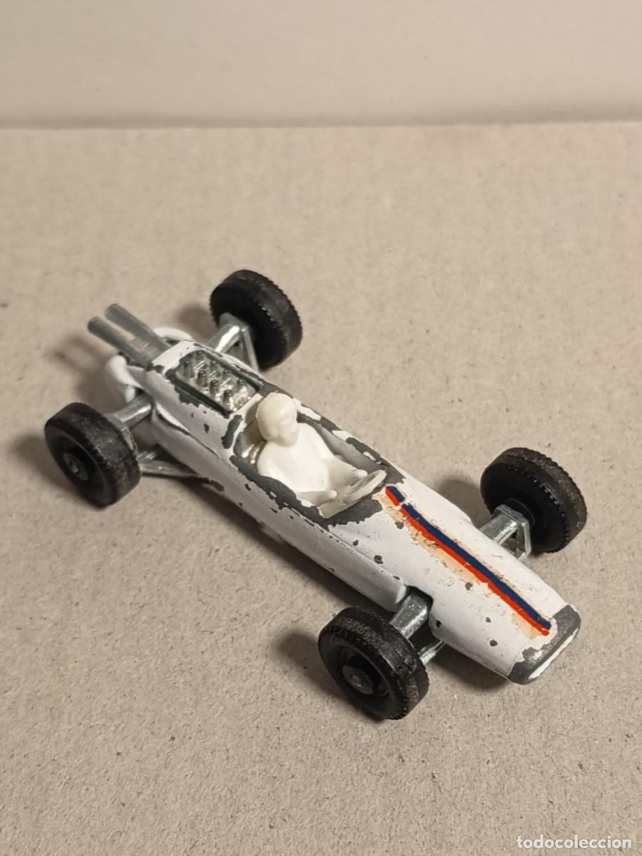 Coches a escala: COCHE METALICO INTERNATIONAL PAYA LOTUS F-1 N&deg;2102 MADE IN SPAIN CON CONDUCTOR