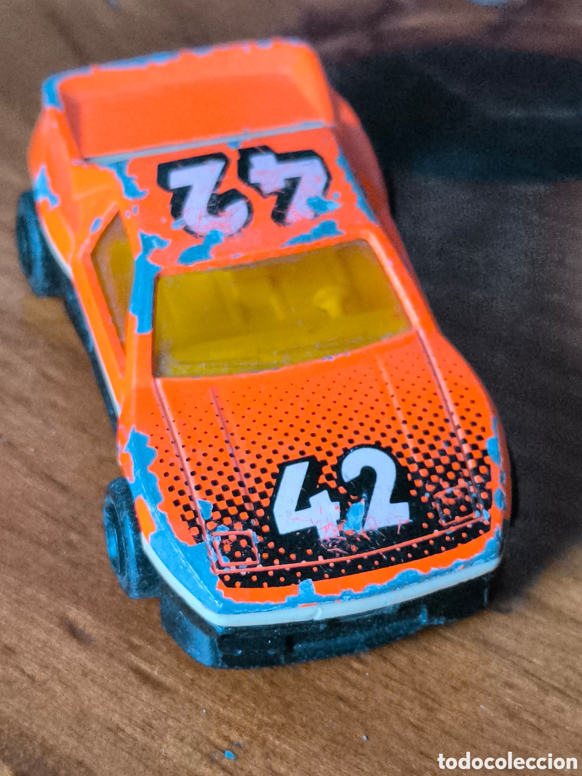 Coches a escala: Majorette Pontiac Fiero Race Car Orange and Black 1:55 Scale #206 France