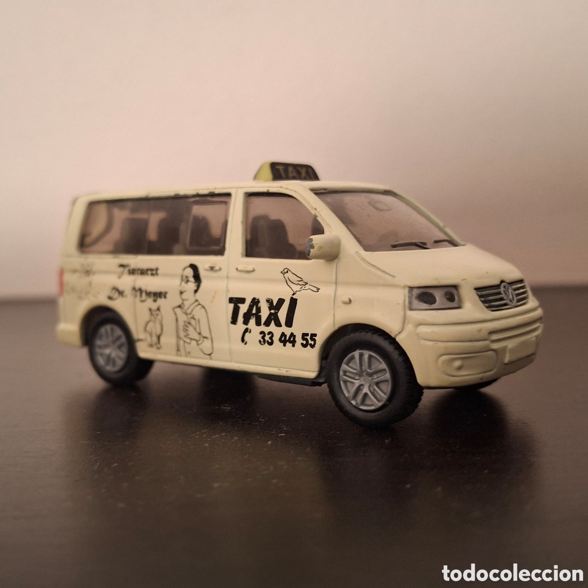 Coches a escala: SIKU VOLKSWAGEN MULTIVAN TAXI VW T5 - VETERINARIO DR. MEYER - ESCALA 1/55 TIPO 1/64 - MODELO RARO