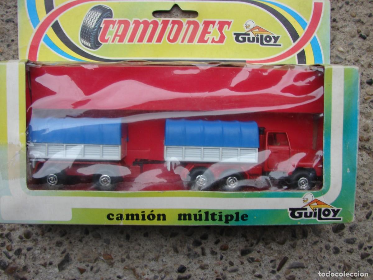 Coches a escala: CAMI&Oacute;N FORD 3 EJES CON REMOLQUE Y TOLDOS AZULES - GUILOY