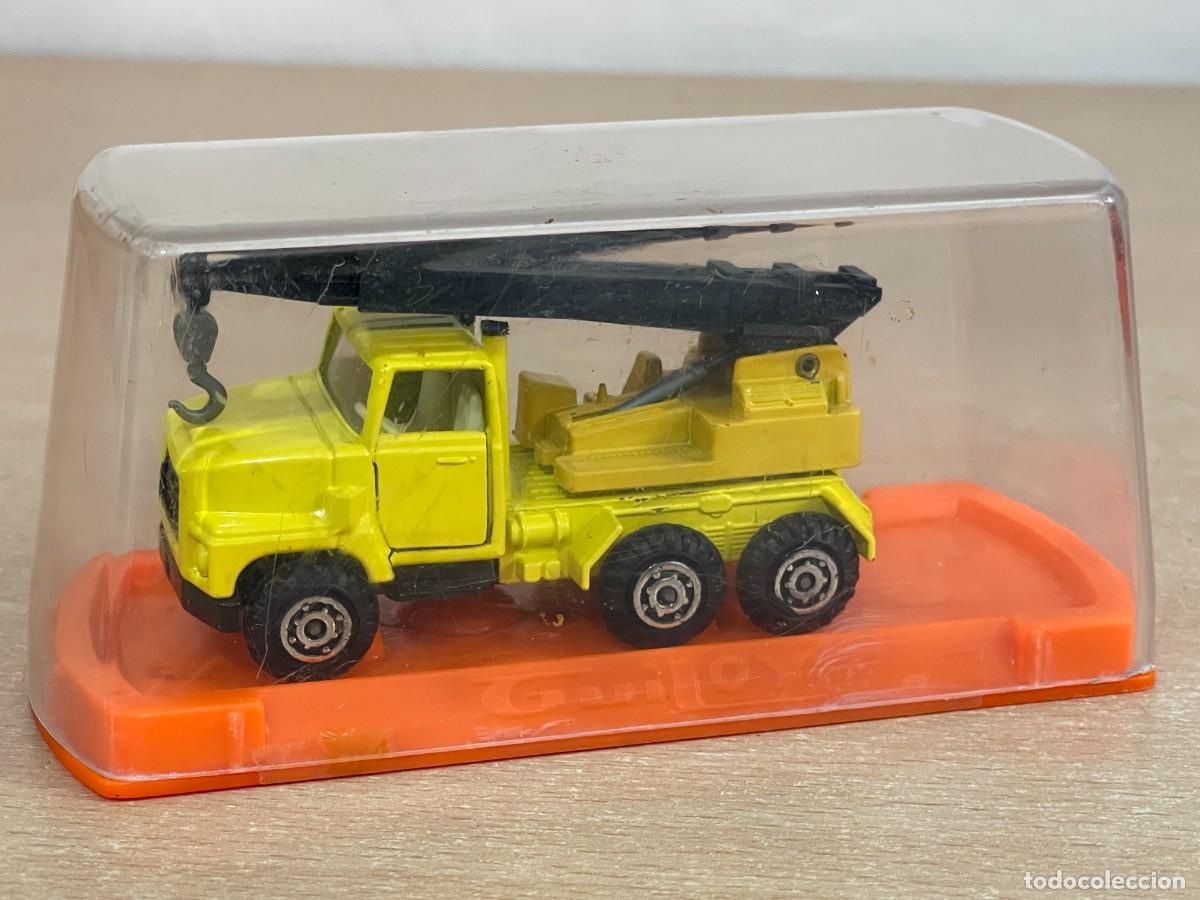 Coches a escala: 157- Guiloy Cami&oacute;n FORD Gr&uacute;a amarillo Made in Spain die-cast metal truck 1/66 a&ntilde;os 70