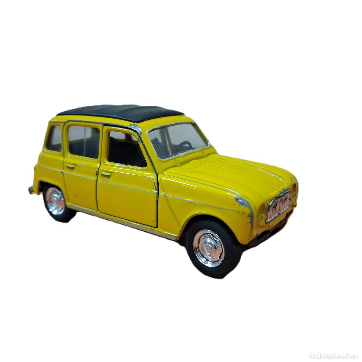 Coches a escala: Carro de colecci&oacute;n Welly Renault 4 en color amarillo con signos visibles de uso