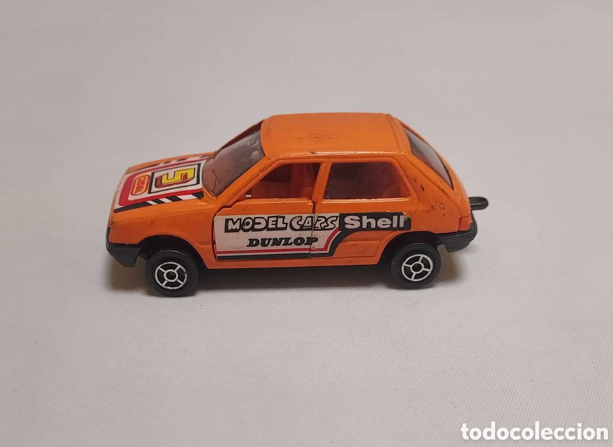 Coches a escala: Peugeot 205 1:64 a&ntilde;os 80 Espa&ntilde;a
