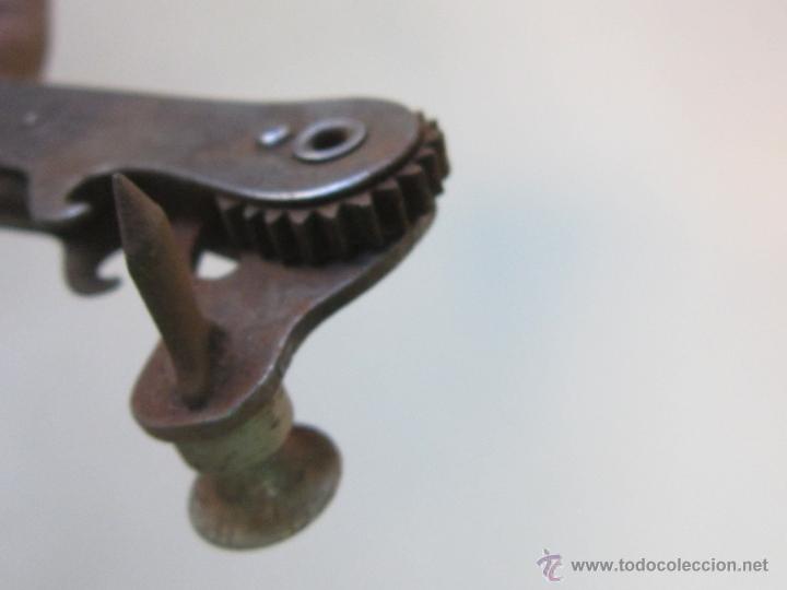 Abrebotellas y sacacorchos de colecci&oacute;n: ABREBOTELLAS EN METAL - Foto 4