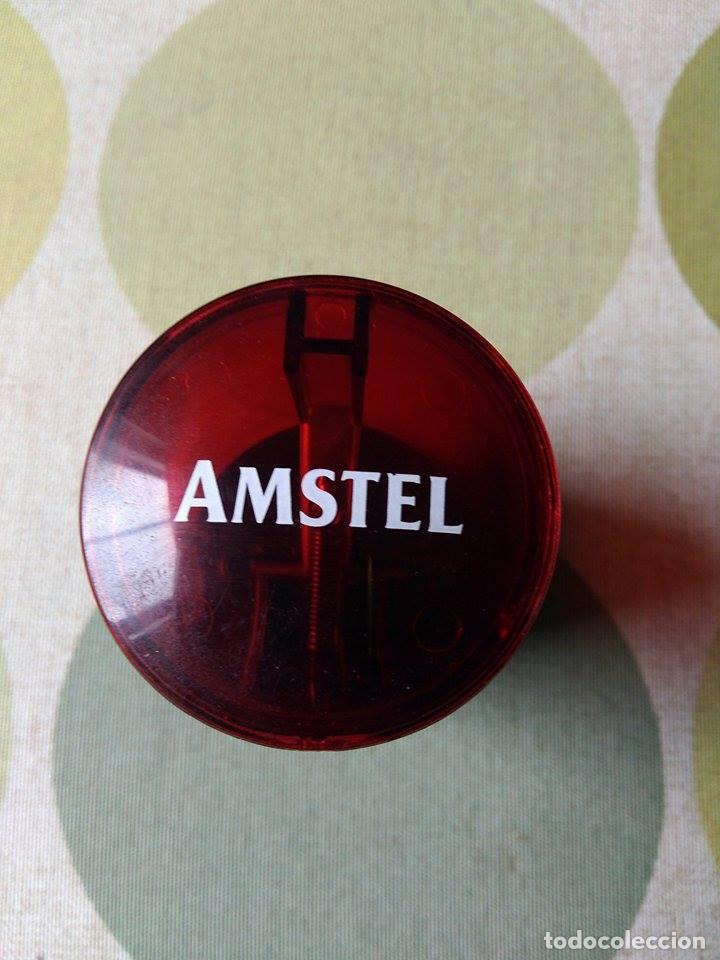 Abrebotellas y sacacorchos de colecci&oacute;n: Raro abrebotellas Amstel. - Foto 1