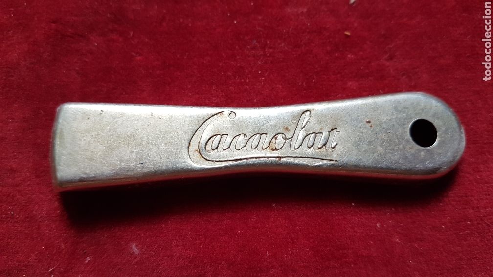 Abrebotellas y sacacorchos de colecci&oacute;n: Abridor Cacaolat - Foto 1