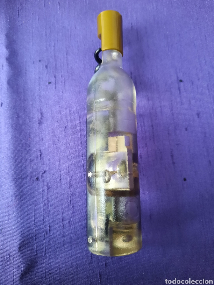 Abre-c&aacute;psulas e Saca-rolhas de cole&ccedil;&atilde;o: Sacacorchos abridor abrebotellas con forma de botella