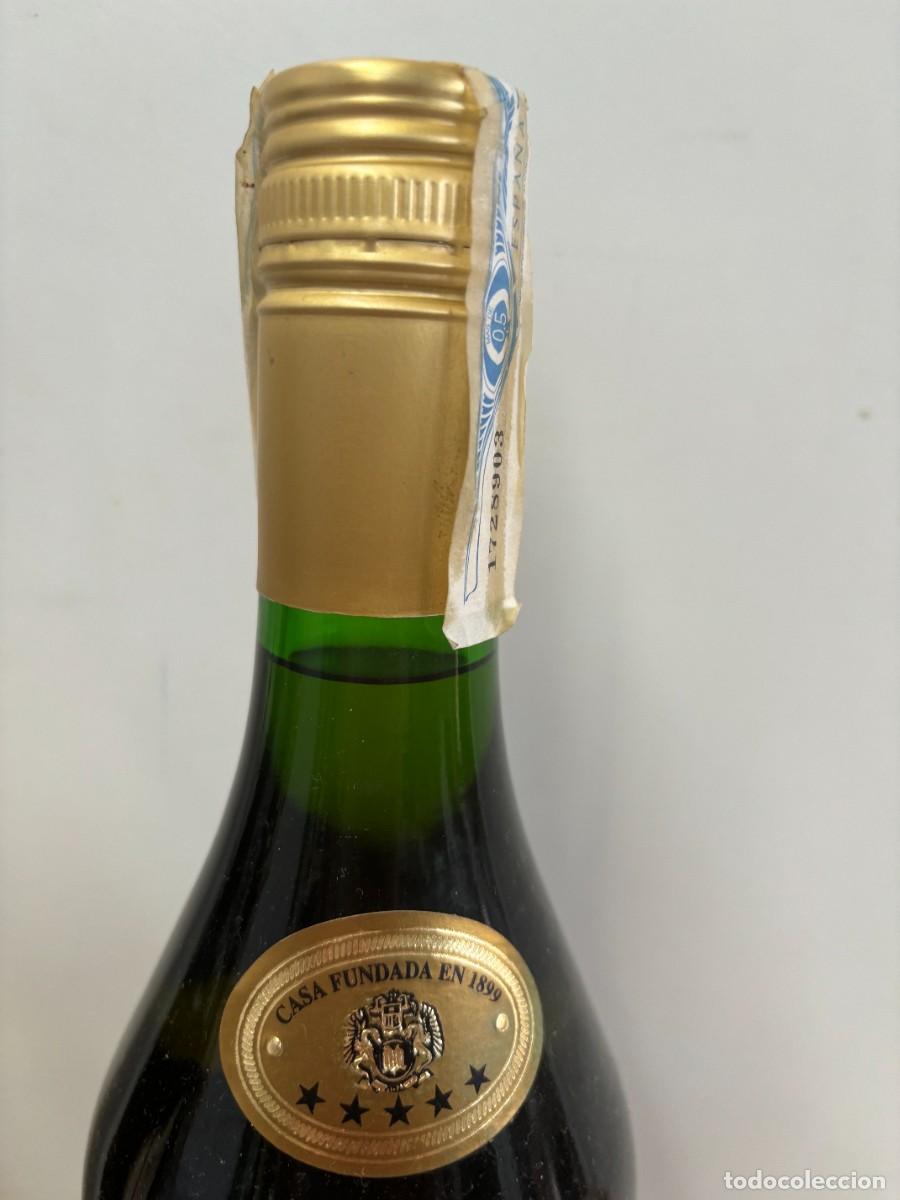 Abrebotellas y sacacorchos de colecci&oacute;n: BOTELLA BRANDY NAPOLEON PRECINTADA - Foto 3
