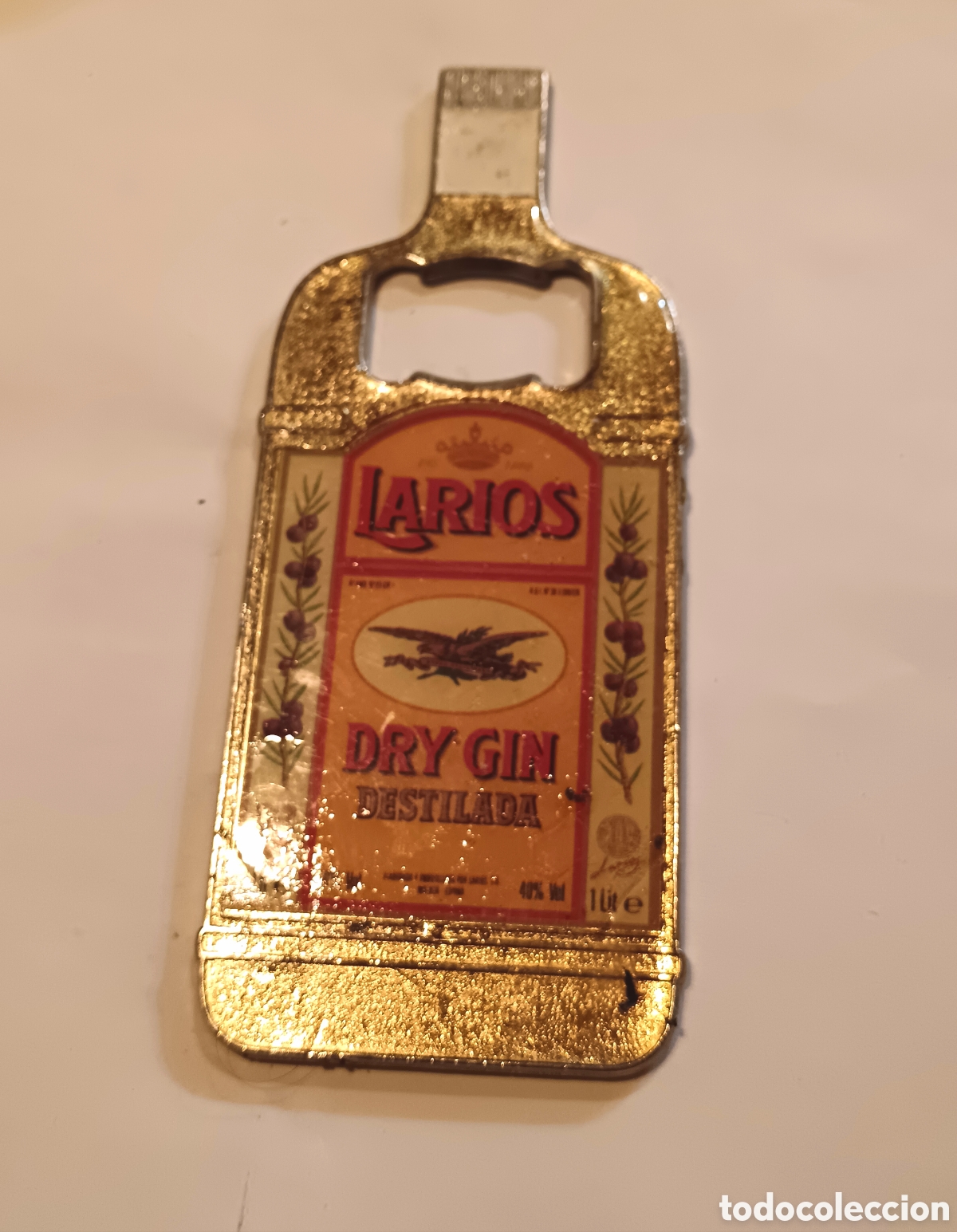 Bottle opener and Corkscrew: Abrebotellas Ginebra Larios