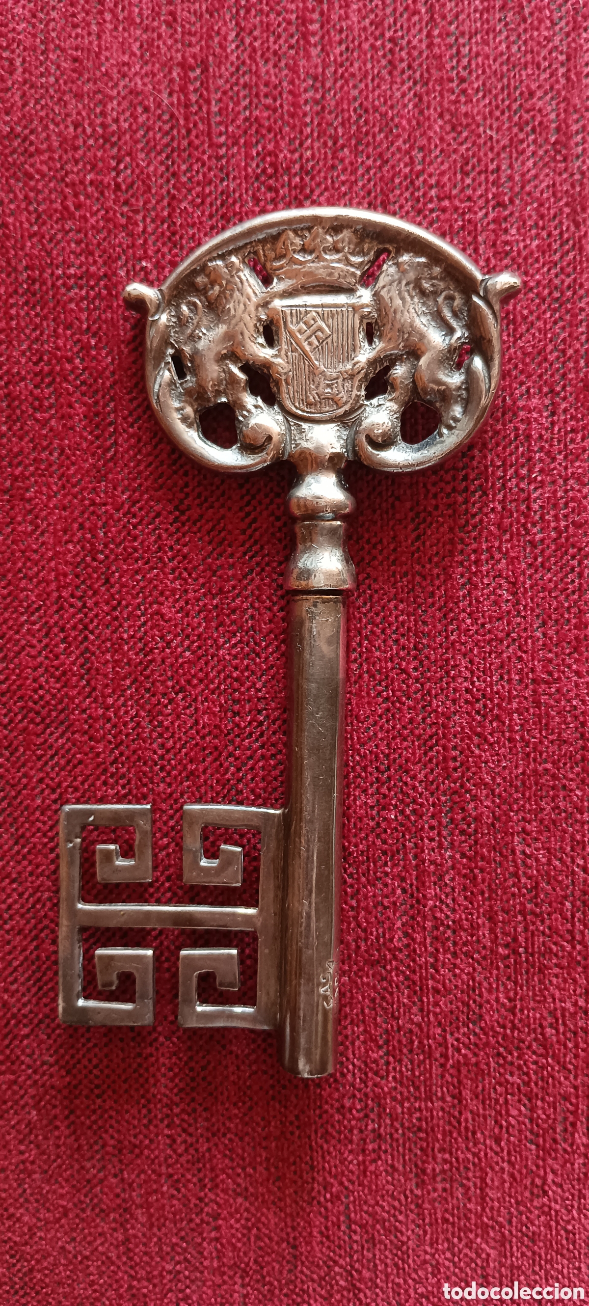Abrebotellas y sacacorchos de colecci&oacute;n: Llave sacacorchos plateado Casa Candela. 0900 Chile.Aprox.a&ntilde;os 1950s.