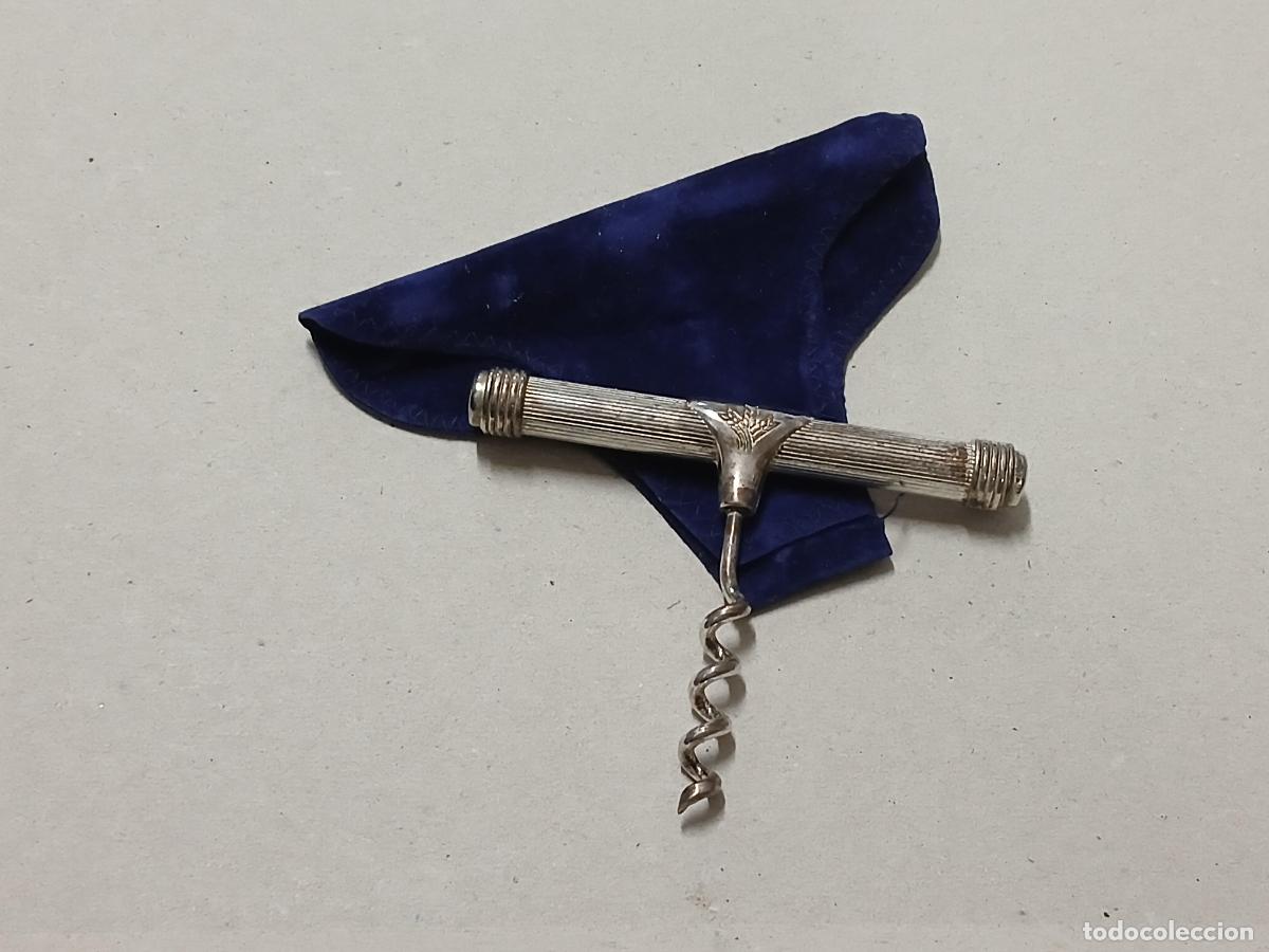 Abrebotellas y sacacorchos de colecci&oacute;n: Publicidad. Sacacorchos Caja Rural chapado plata