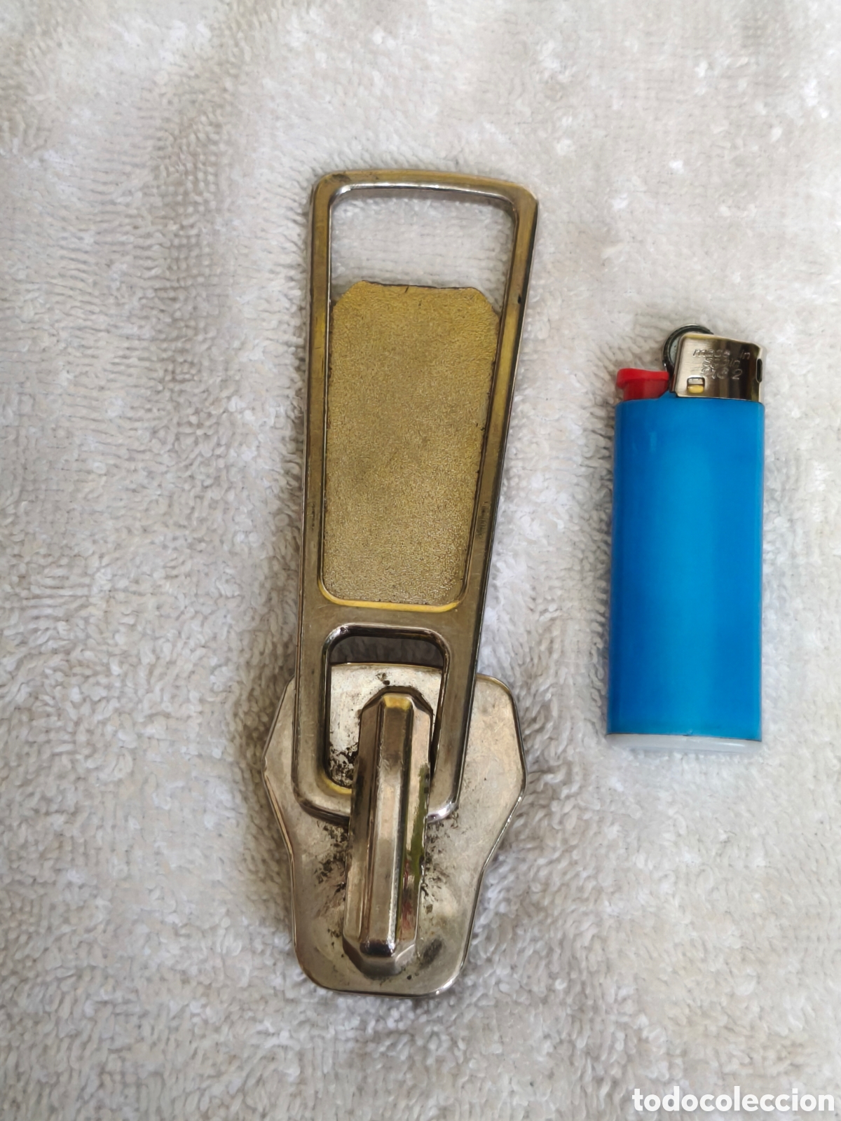 Abrebotellas y sacacorchos de colecci&oacute;n: Abridor de botellas en forma de cremallera