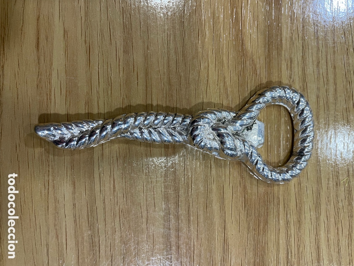 Abrebotellas y sacacorchos de colecci&oacute;n: Abridor vintage nudo cuerda metal Plateado
