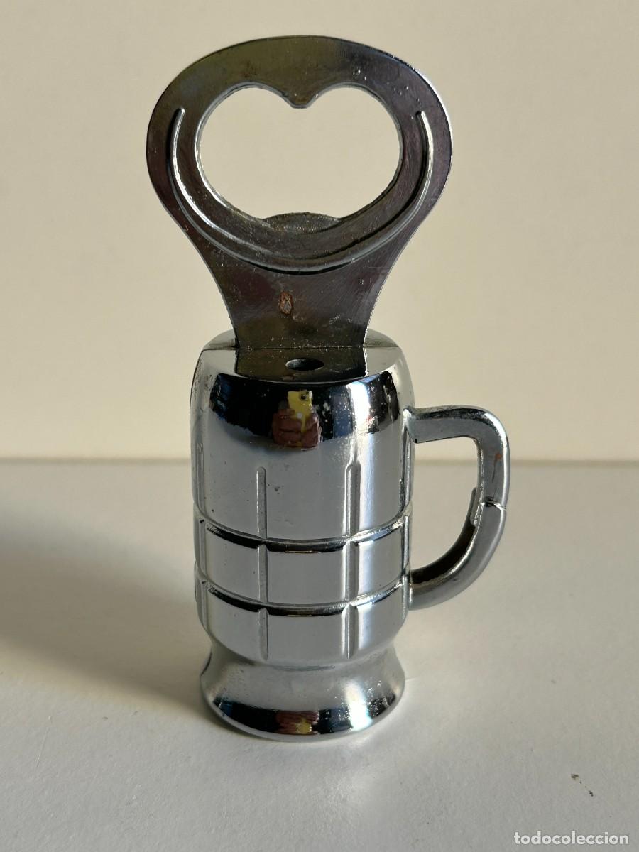 Abrebotellas y sacacorchos de colecci&oacute;n: Abrebotellas mechero forma de jarra