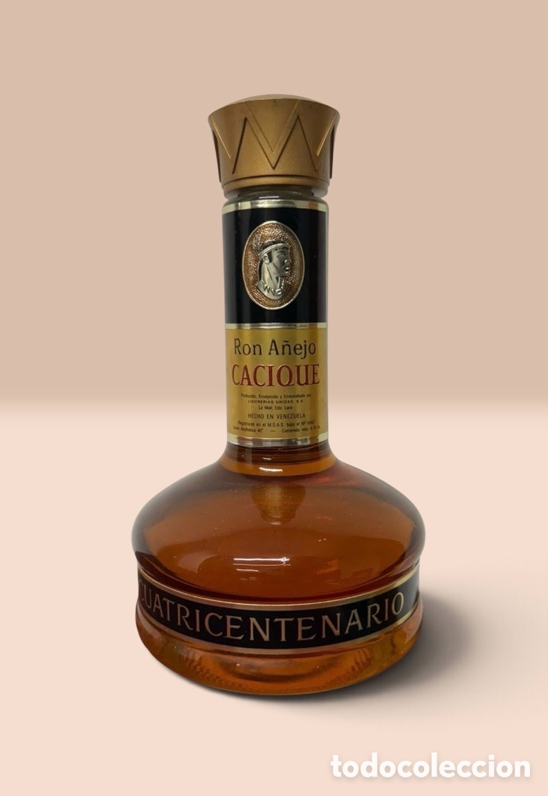 Abrebotellas y sacacorchos de colecci&oacute;n: Botella &uacute;nica de ron cacique Cuatricentenario. Muy pocas unidades