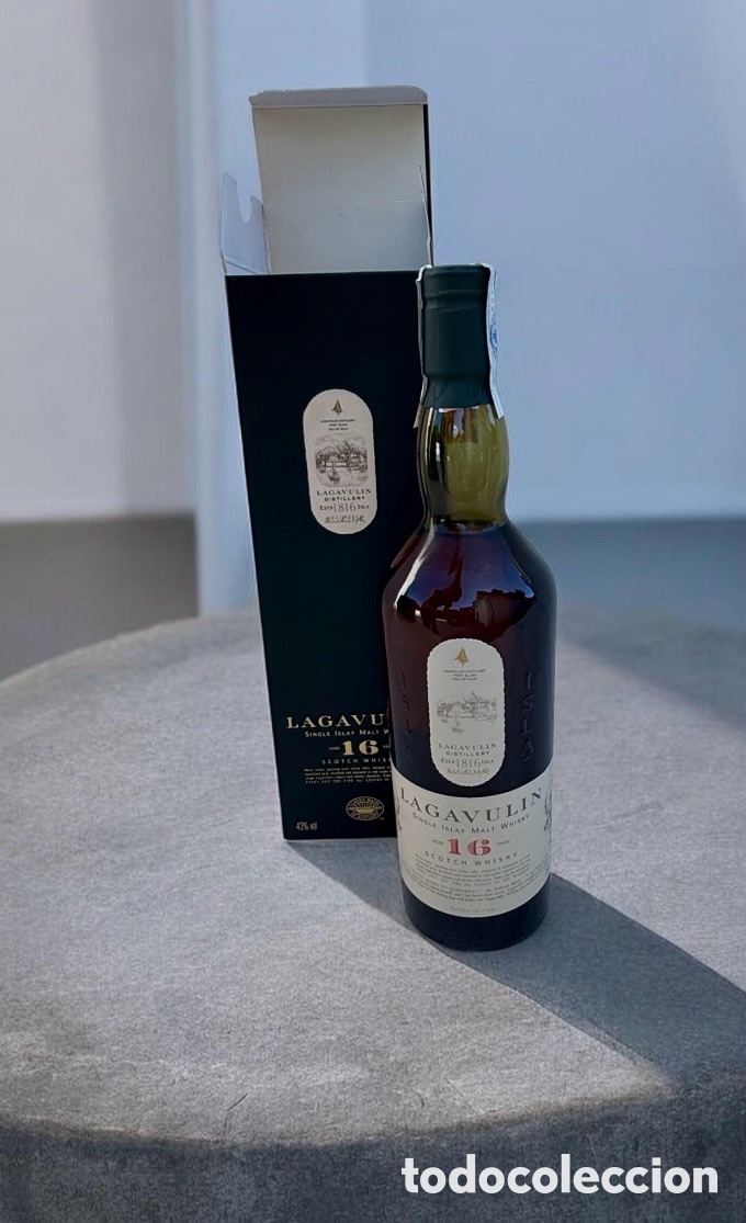 Abrebotellas y sacacorchos de colecci&oacute;n: Botella antigua de Whisky Lagavulin 12 A&ntilde;os