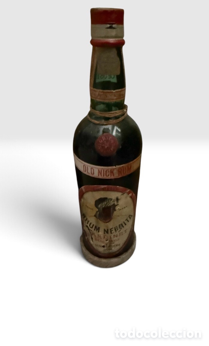Ouvre-bouteilles et tire-bouchons &agrave; collectionner : Botella antigua Rhum Negrita Bardinet / Old Nick Rum
