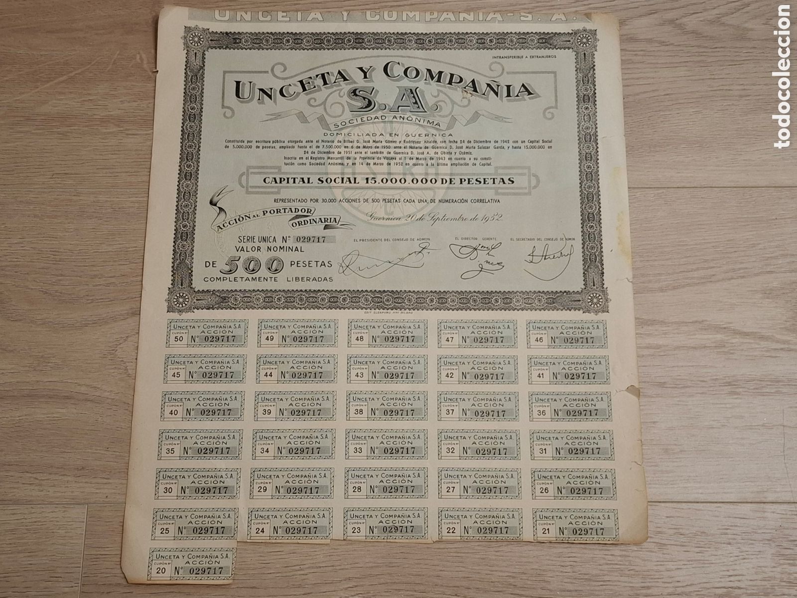 Coleccionismo Acciones Espa&ntilde;olas: Unceta y Compa&ntilde;&iacute;a, S.A. Acci&oacute;n de 500 pesetas, Guernica 1952, firma original, pistolas Astra