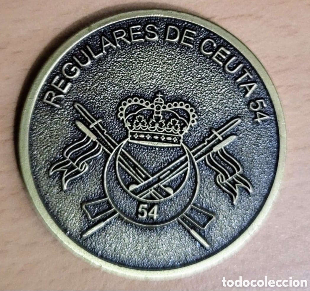 Banderines de colecci&oacute;n: Moneda conmemorativa Grupo de Regulares 54 de Ceuta en bolsa