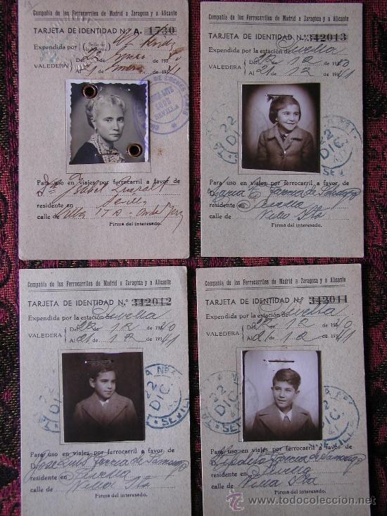 Coleccionismo Billetes de transporte: 4 TARJETAS DE IDENTIDAD PARA USO DEL FERROCARRIL. SEVILLA. (MADRE Y 3 HIJOS)