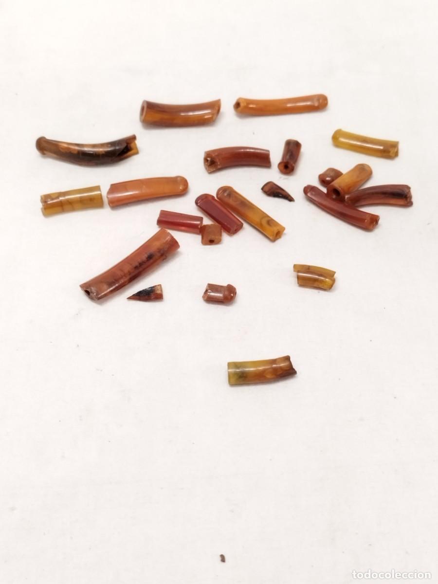 Boquillas de colecci&oacute;n: Lote de resto,trozos de &aacute;mbar de boquillas de fumar tabaco. Cigarros, cigarrillo.