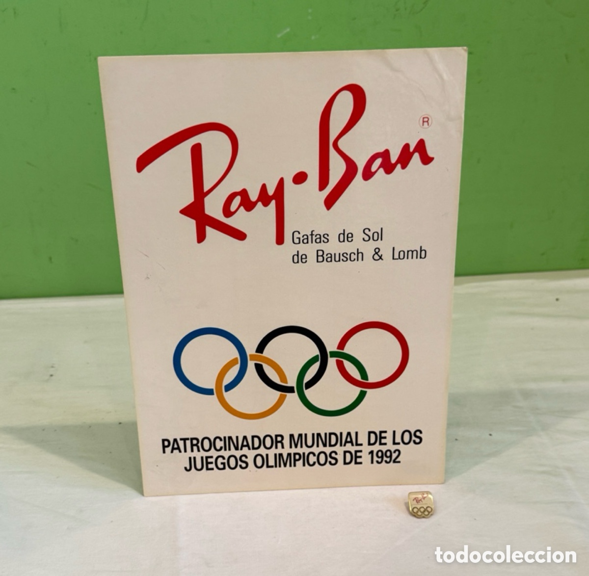 Coleccionismo de carteles: Ray Ban Juegos Ol&iacute;mpicos Barcelona 92 Cartel Publicitario Vintage + Pin Original