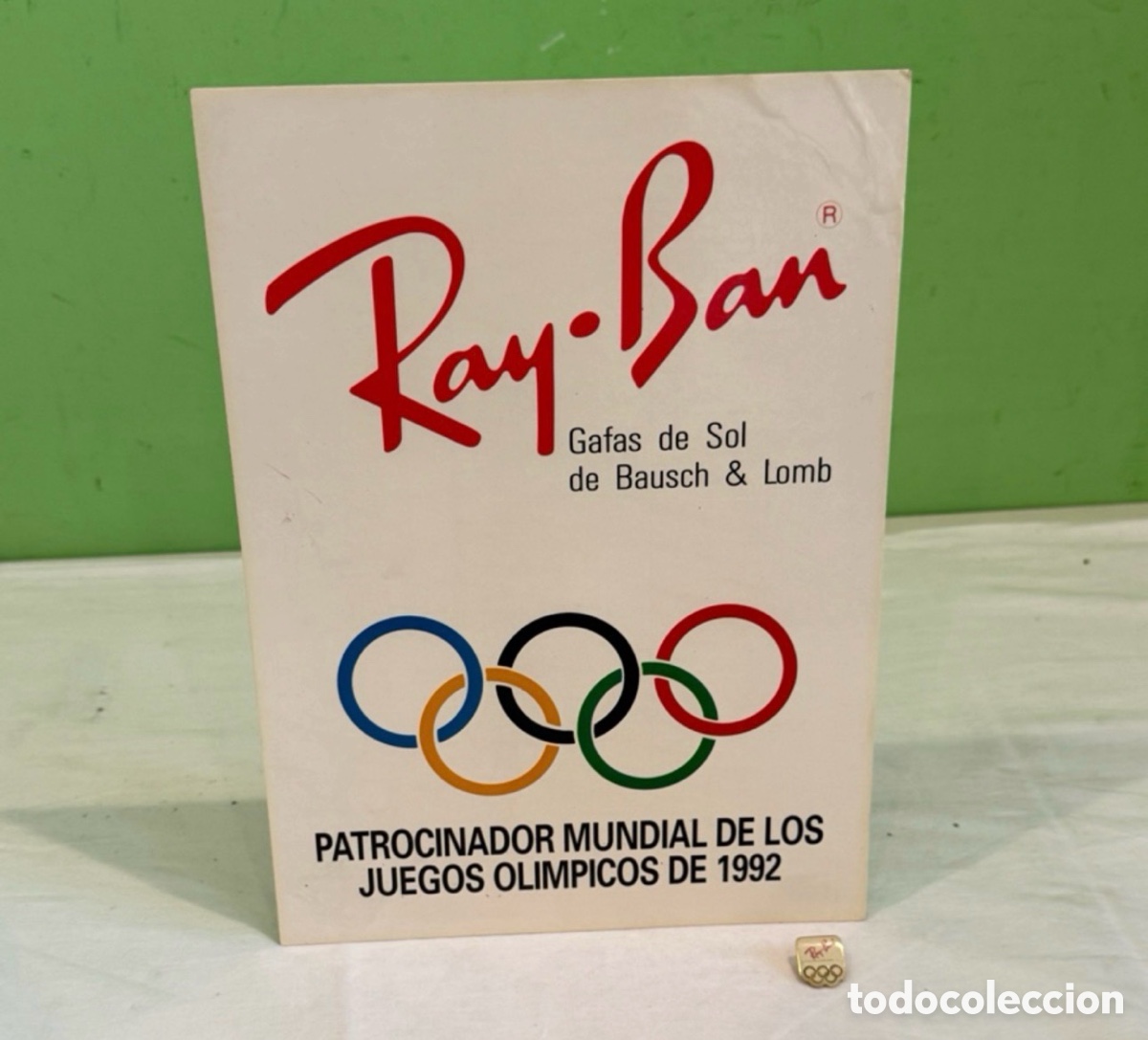 Coleccionismo de carteles: Ray Ban Juegos Ol&iacute;mpicos Barcelona 92 Cartel Publicitario Vintage + Pin Original