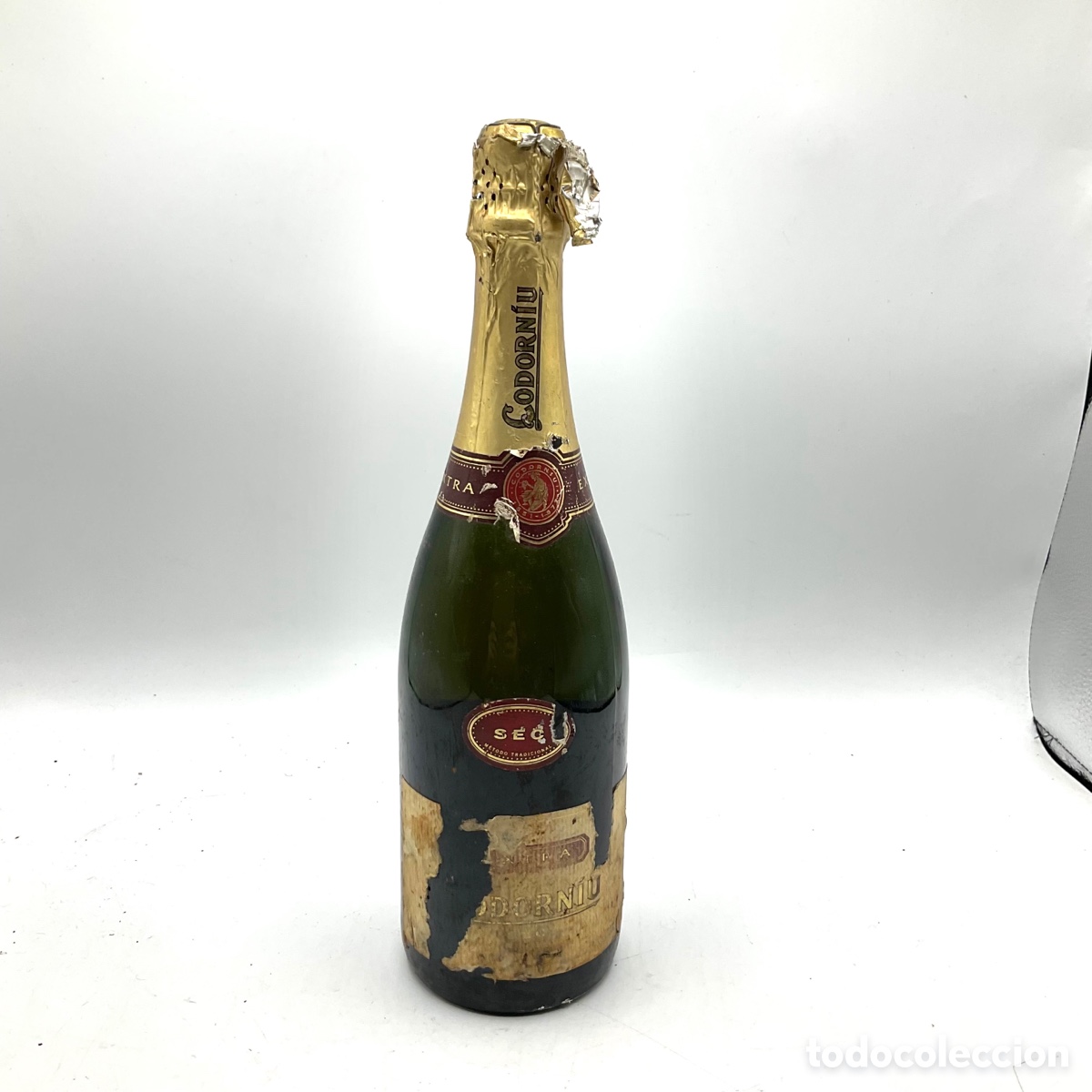 Coleccionismo de cava: BOTELLA DE CAVA CODORNIU EXTRA SEC - Antigua botella llena sin abrir - Foto 1