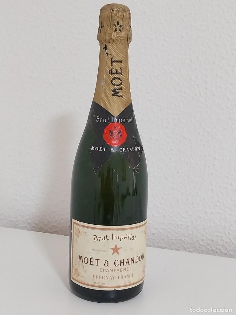 Coleccionismo de cava: Botella Vintage Champagne Mo&euml;t & Chandon Brut Imp&eacute;rial - A&ntilde;os 70 - Importaci&oacute;n Alfonso Ferrer S.A.