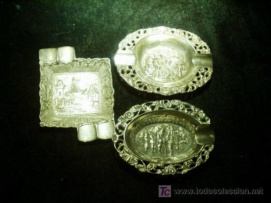 Ashtrays: Ceniceros de plata.Tres