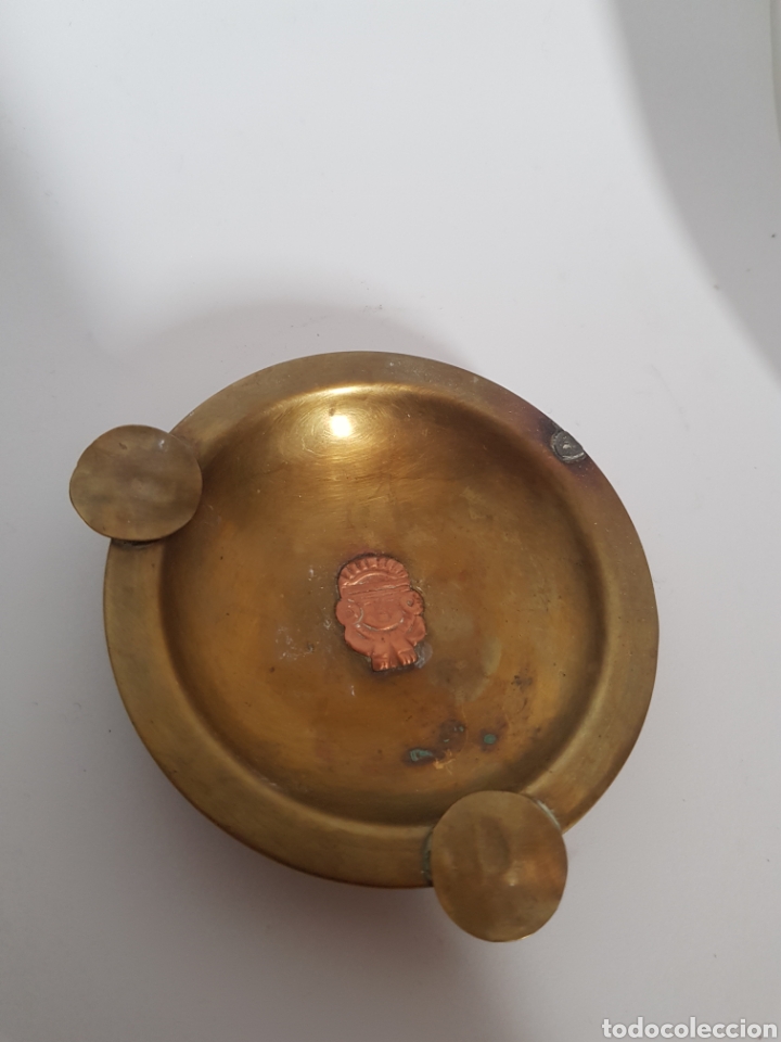 Aschenbecher: Cenicero en bronce con motivo azteca o Inca