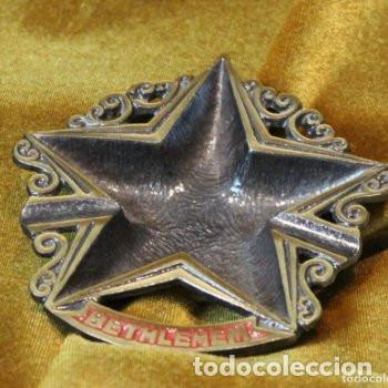 Cendriers: Cenicero en forma de estrella de cinco puntas, bronce, Bel&eacute;n.