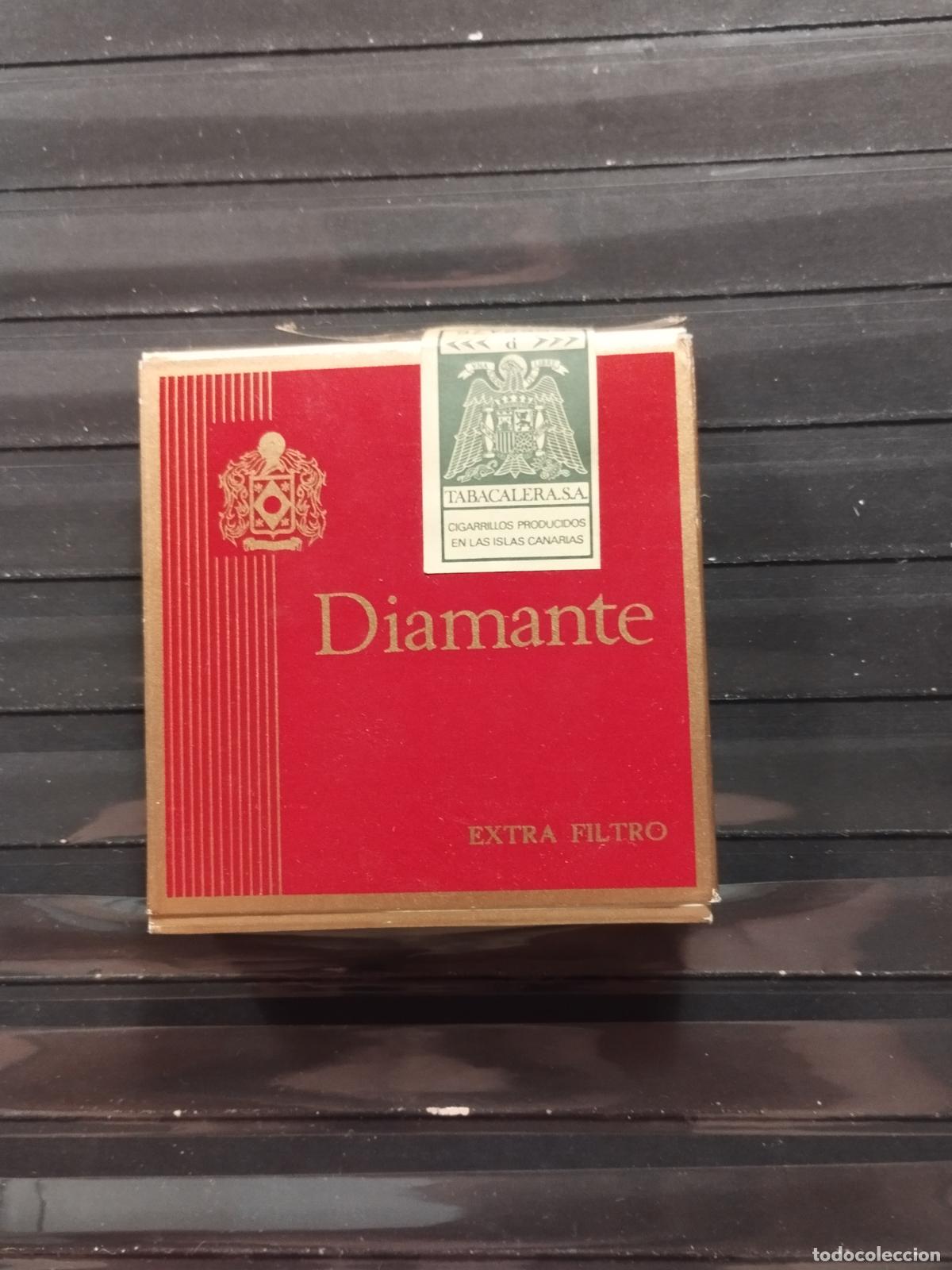 Cajas de cerillas: PAQUETE DE CIGARRILLOS. DIAMANTE. EXTRA FINO. CON TODO SU CONTENIDO.