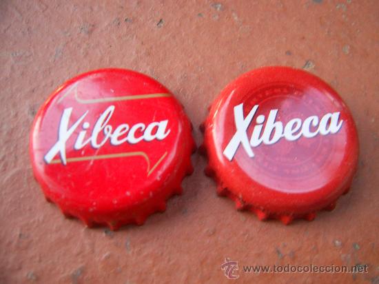 Coleccionismo de cervezas: 2 CHAPAS BEER BIRRA CERVEZA XIBECA DE S.A.DAMM. BARCELONA. FAB. CHAPAS: U.--LOTE N. 1323---CARMANJO