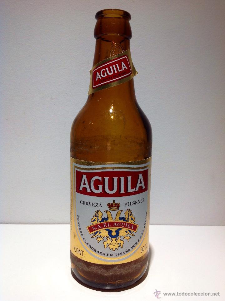 Collectionnisme de bi&egrave;res: ANTIGUA BOTELLA CERVEZA *AGUILA* PILSENER, 33 CL.TERCIO - CONSUMIR ANTES DEL 94, ETIQUETA DE PAPEL