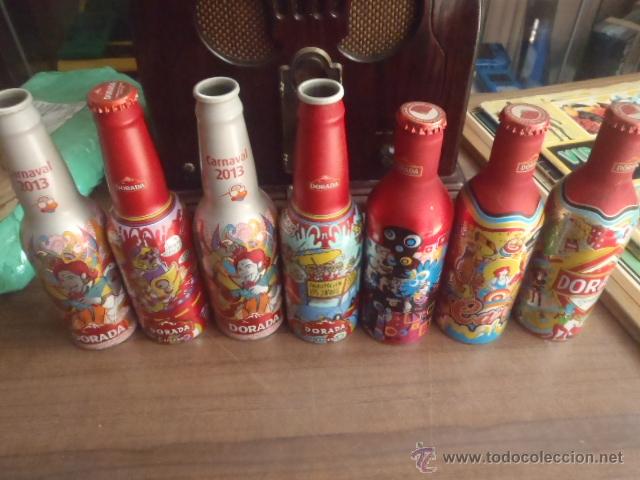 Coleccionismo de cervezas: 9 BOTELLINES DE ALUMINIO DE CERVEZA DORADA CARNAVAL DE TENERIFE.