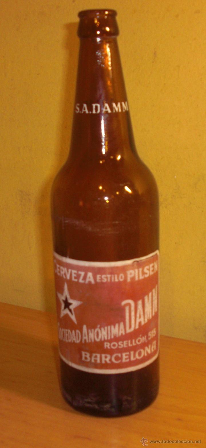Coleccionismo de cervezas: DAMM BOTELLA DE CERVEZA 750 CC  ROSELLON 515 BARCELONA