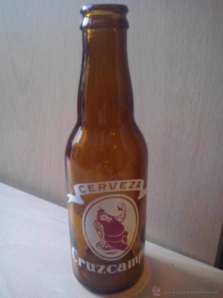 Coleccionismo de cervezas: botella botelllin cruzcampo 20 cl . con serigrafia
