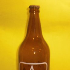 Coleccionismo de cervezas: DAMM XIBECA ANTIGUA BOTELLA VACIA CON TAPON (OXIDADO). Lote 48524310
