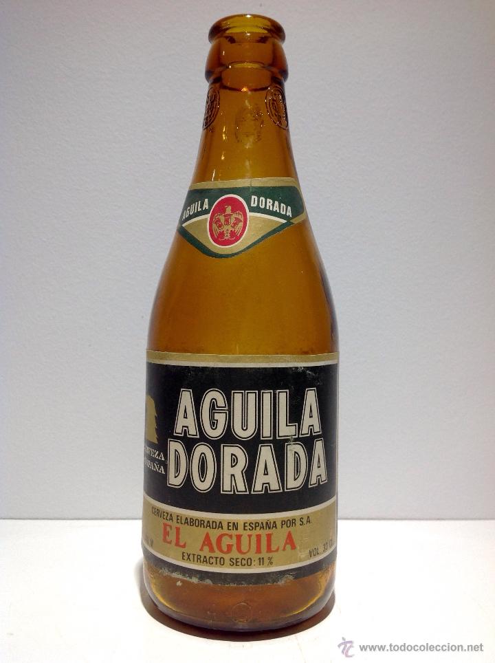 Collectionnisme de bi&egrave;res: ANTIGUA BOTELLA DE CERVEZA *AGUILA DORADA *33 CL.-MOD.4- ETIQ.INF.DIFERENTE, TERCIO