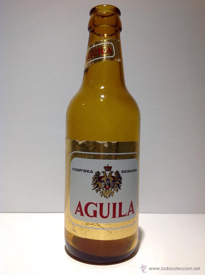 Collectionnisme de bi&egrave;res: ANTIGUA BOTELLA DE CERVEZA * AGUILA * ETIQUETA DE PAPEL 33 CL , TERCIO