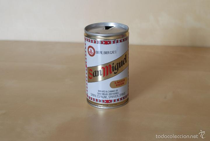 Coleccionismo de cervezas: Lata de Cerveza. San Miguel. Tiene dos tapas y el lateral esta&ntilde;ado. Beer can.