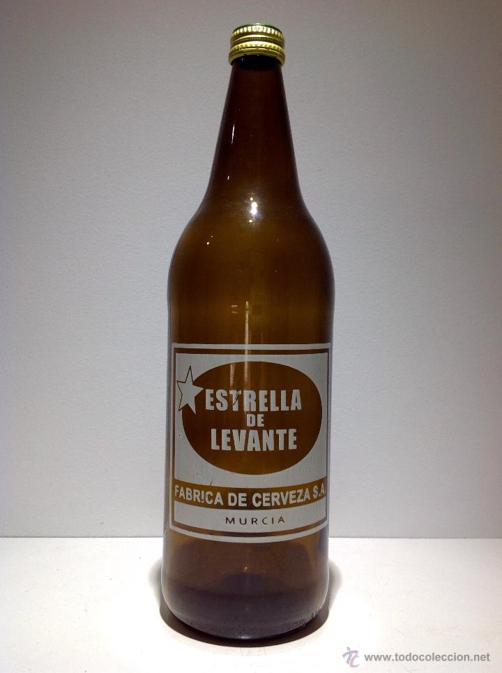 Collectable Beer: BOTELLA DE UN LITRO DE CERVEZA * ESTRELLA LEVANTE * REPRODUCCI&Oacute;N MODERNA,VAC&Iacute;A CON TAPON Y CERRADA.
