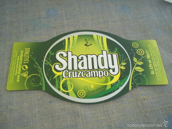 Coleccionismo de cervezas: ANTIGUA Y GRAN ETIQUETA CERVEZA SHANDY CRUZCAMPO DIVINA ADIVINANZA BAILARINA 150 CL NUEVA SIN USAR