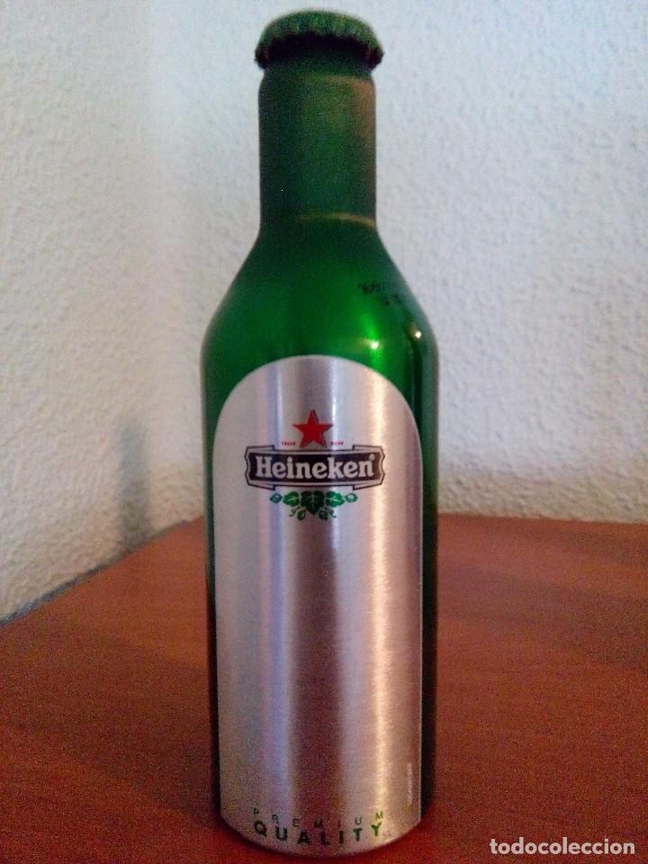 Coleccionismo de cervezas: BOTELLA MONOBLOCK CERVEZA HEINEKEN VAC&Iacute;A